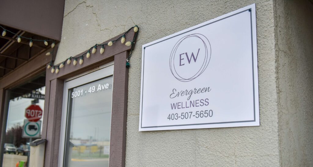 Evergreen Wellness - Sign and the address 