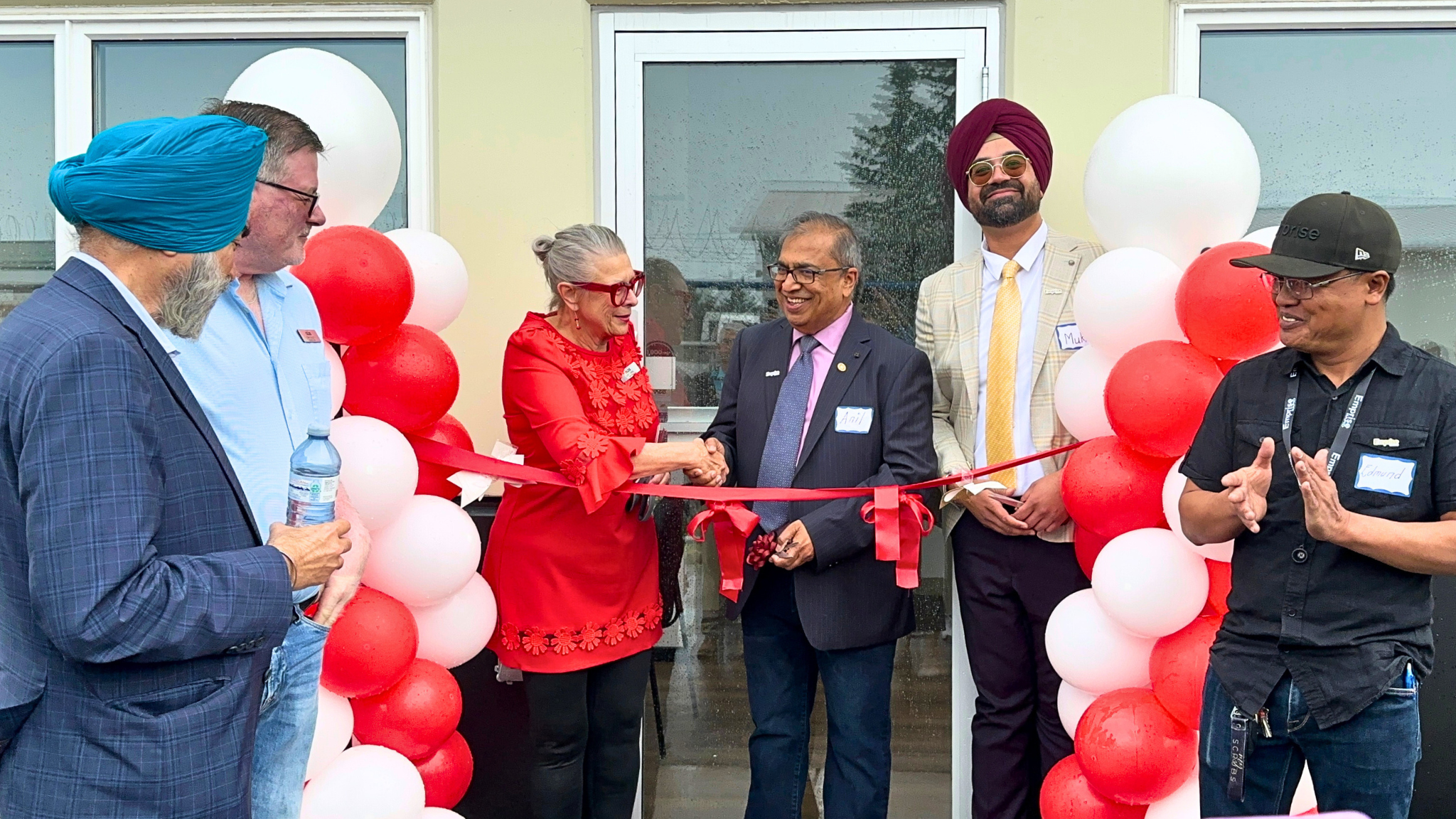 Ribbon cutting with Mayor Judy Dahl and the owners of Emprise Canada Inc (Anil Jain and Mukhdeep Mangat)